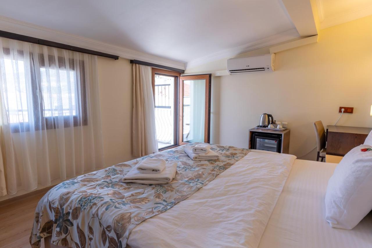 Hotel Karacam Foça Bagian luar foto